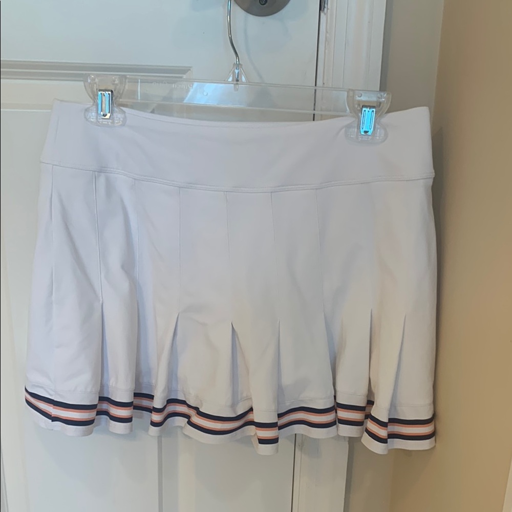 White Pleated Skirt with Striped Hem
